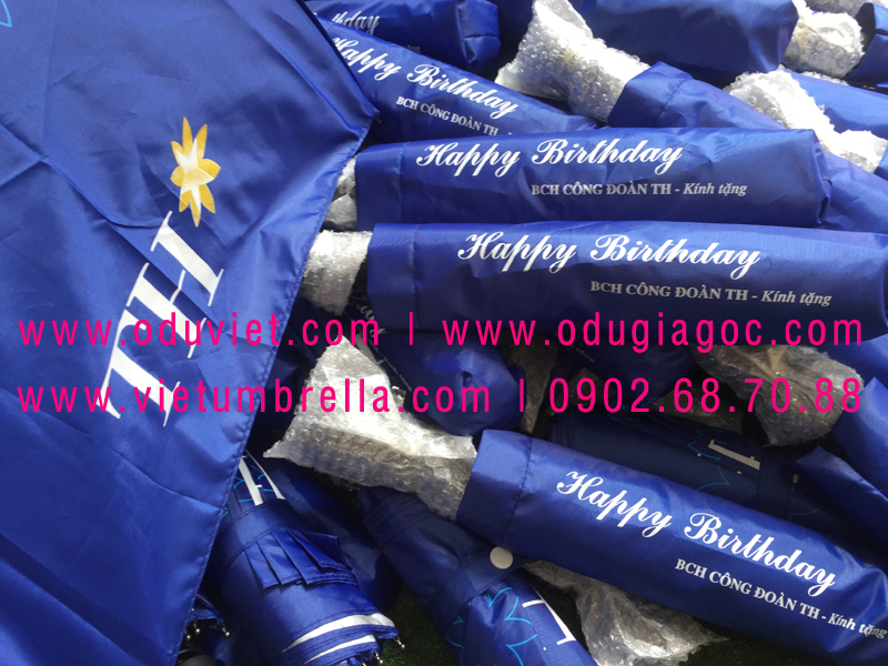 xưởng sản xuất ô dù cầm tay in logo quảng cáo